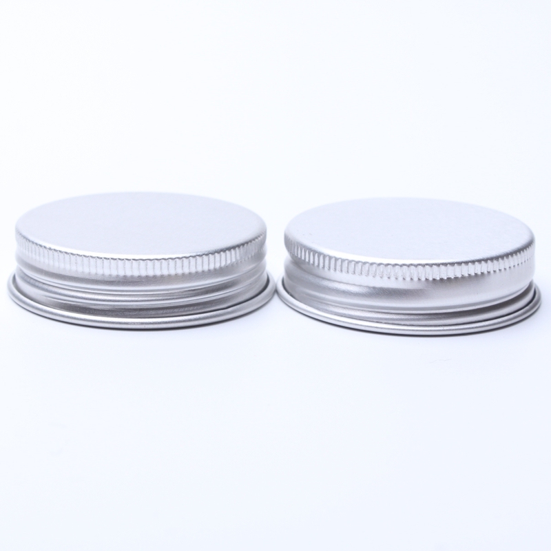 Gold and Silver Aluminum Screw Lids