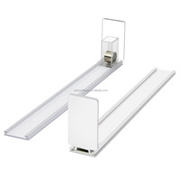 Système de poussoir de bouteilles et de cigarettes à ressort rechargeable à largeur réglable