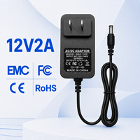 Adaptateur secteur AC/DC 12V 2A certifié CE et approuvé FCC avec protection contre les surtensions, prise US 5,5x2,5mm, chargeur mural 24W, ODM/OEM