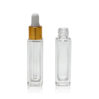 Flacon compte-gouttes en verre carré rectangulaire de 10ml 1/3 oz avec collier noir doré pour emballage d'huile de barbe d'huile de parfum essentiel