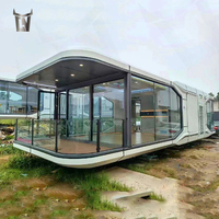 Capsule spatiale préfabriquée innovante en acier – Maison intelligente durable, cabane de glamping moderne, salon/chambre portable de haute technologie