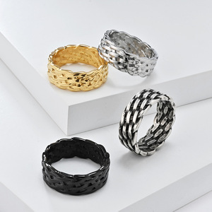 Unique, stylish, androgynous woven braided <b>titanium</b> steel <b>ring</b> for men and women, exuding sophistication and elegance. - Product Image 1