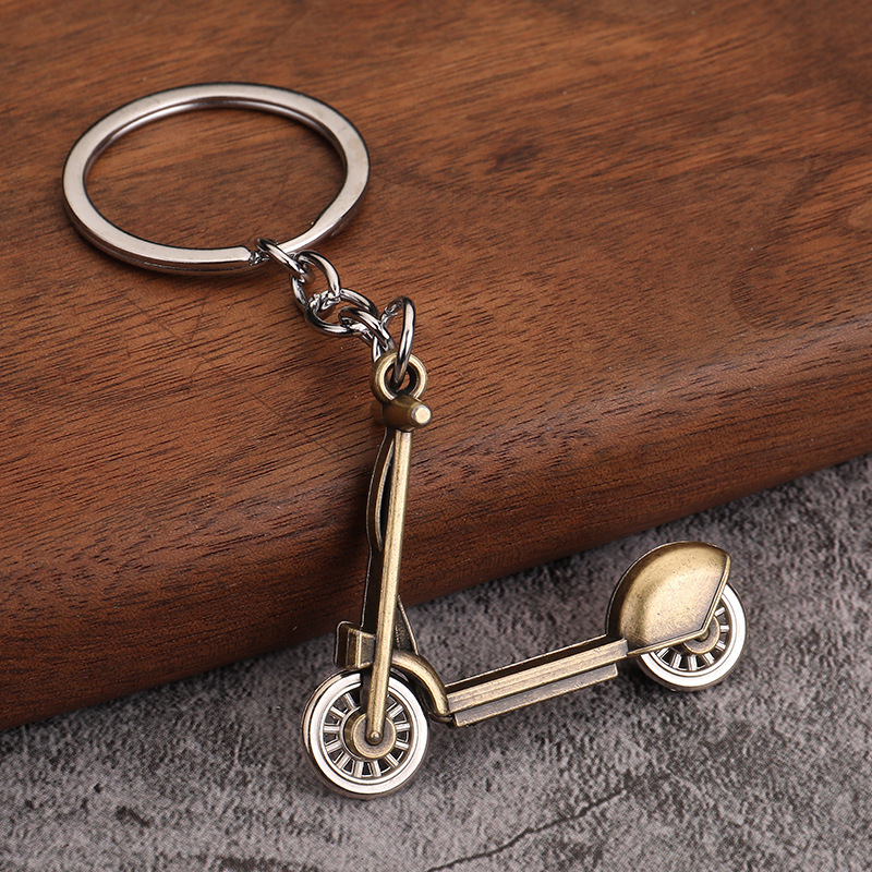 Trottinette ancienne en bronze