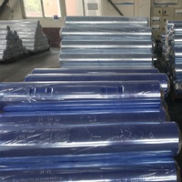 Rouleau de film PVC transparent souple et normal, film PVC transparent résistant à l'humidité pour la couverture de table, les rideaux, l'emballage et la décoration