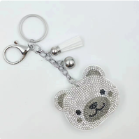 Porte-clés de haute qualité, best-seller, orné de strass scintillants multicolores en forme de lune et d'œil protecteur, avec pompons