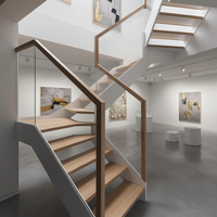 Escalier flottant en bois pour appartement préfabriqué au design moderne et épuré, avec marches en bois pour l'intérieur