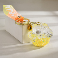 Mini-cadeau exquis - Porte-clés patte de chat en plastique écologique, créatif, en acrylique, avec perles lumineuses à l'huile et sable liquide