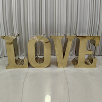 Support de table en métal doré en acier inoxydable avec lettres LOVE en miroir pour présentation de desserts et gâteaux, idéal pour la décoration d'événements de mariage