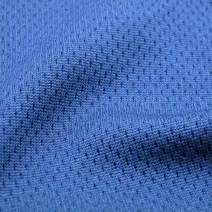 Tissu en maille personnalisé en gros polyester puissance élastique extensible trou d'oeil d'oiseau maille diamant tissu pour vêtements de sport robes