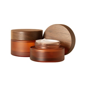 Nhà Máy Gỗ Bìa Thủy Tinh Mỹ Phẩm Lọ 1Oz 1.6Oz 3Oz Hổ Phách Mặt Mắt Kem <span class=keywords><strong>Jar</strong></span> Với Nắp Tre Biểu Tượng Tùy Chỉnh Tre Bao Bì - Product Image 1