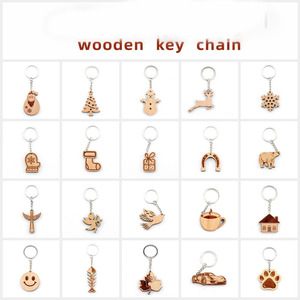 Vente en gros de cadeaux créatifs DIY, pendentif en bois gravé au laser, porte-clés en forme d'animal, porte-clés en bois DIY - Product Image 1