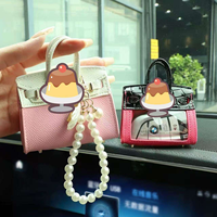 Nouveauté 2026 : Mini porte-sacs de luxe, ornements, porte-monnaie mignon, porte-clés, étui pour écouteurs pour femmes, porte-clés zéro
