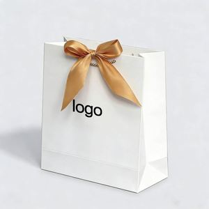 Factory Direct Customizable Free Design White Paper Gift <b>Bag</b> With Gold Ribbon Bow Luxury Ideal for Small Business & Gifting - Product Image 1