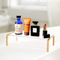 Support de présentation moderne en acrylique transparent pour sacs à main et chaussures avec cadre doré élégant pour présentoir de vitrine