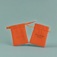 Pochette d'emballage de bijoux de luxe en microfibre orange faite à la main avec fermeture à nouer et doublure en velours personnalisée