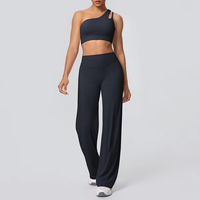 Nouveautés en gros : Ensemble de sport 2 pièces pour femme – Tenue de fitness et de gym personnalisée avec soutien-gorge de sport sexy à dos nu et short uni