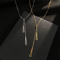 Collier ras du cou tendance en acier inoxydable doré, style luxe léger, avec chaîne à maillons allongés, pendentif en Y, réglable, géométrique, creux, à franges, pour soirée