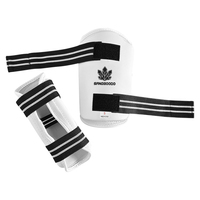 Protège-tibias de Taekwondo en mousse PU avec sangle élastique réglable pour l'entraînement et le sparring, personnalisables avec logo pour clubs et dojos, commande en gros