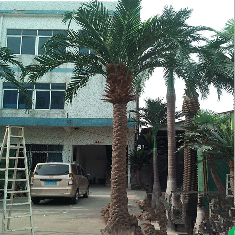 Simulated coconut tree artificial props in large shopping malls tropical palm tree leaves preservation bend pole decoration