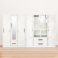 Porte coulissante d'armoire de chambre à coucher en acier à motif personnalisé d'approvisionnement d'usine avec miroir et tiroir LEMARI PAKAIAN