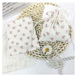 ถุงผ้าฝ้ายขายส่ง นุ่ม สบาย ดีไซน์ถุงกันฝุ่น ผลิตจากผ้าฝ้ายไทย ถุงผ้ารูดเชือก 13*10 สีเทาอมน้ำตาล สำหรับใส่เครื่องประดับ - Product Image 1