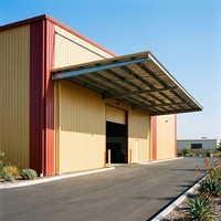 Bâtiment d'entrepôt préfabriqué en structure métallique industrielle à faible coût et installation rapide pour le stockage de semences et d'engrais agricoles