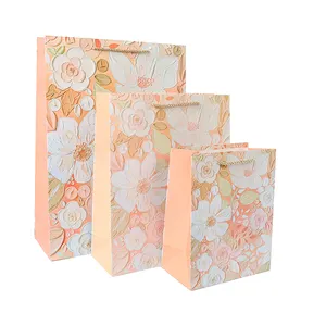 Customized flower pattern commercial paper gift bag with handle can be printed with own pattern and logo bag for packaging