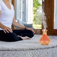 Diffuseur d'huiles essentielles en bois ajouré effet grain de bois arc-en-ciel 0,5-1L pour studio de yoga
