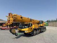 Grue de camion hydraulique QY70 70T avec force de stabilisation de 579 kN pour la construction et les levages lourds en Algérie avec certification CE