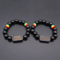 Gelang Hadiah Uniseks Elastis Bergaya Baru Warna Kuning Hijau Merah Hitam Terinspirasi Jamaika dengan Pola Angka dan Huruf dari Manik-manik Resin.