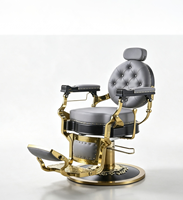 Fauteuil de Barbier Rétro Exquis avec Accents Dorés, Décor Riveté, Capitonnage Gris, Pivotant Hydraulique et Inclinable pour Salon de Coiffure