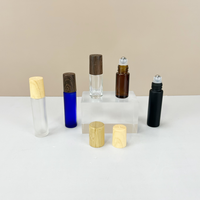 Flacon roll-on pour huiles essentielles et parfums 5ml 10ml avec bouchon en bambou, sérigraphie mate, flacon roll-on portable en acier inoxydable