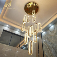 Lustre suspendu LED de style luxueux pour décoration intérieure, villa, escalier, cristal