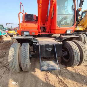 Excavatrice sur roues Doosan DH150W-7 avec godet de terrassement, couleur rouge, équipement d'occasion - Product Image 5