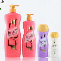 Bouteille pompe en plastique PE rose 400g avec logo personnalisé, forme incurvée pour emballage de liquides capillaires et de soins de la peau grande capacité