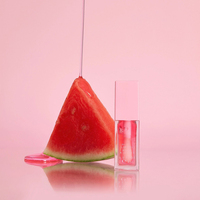 Sérum repulpant brillant pour les lèvres de marque privée avec vitamine E et huile de noix de coco hydrate et réconforte l'huile de soin des lèvres de pastèque non collante