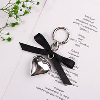 Nouveau porte-clés rétro en tissu noir avec pendentif cœur, porte-clés de couple, porte-clés polyvalent pour sac de voiture