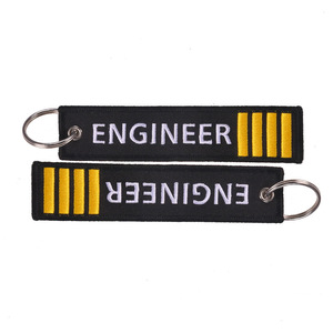 Llavero de tela tejida bordado de doble cara con logotipo de ingeniero personalizado para promoción, con la inscripción 'Remove Before Flight' - Product Image 1