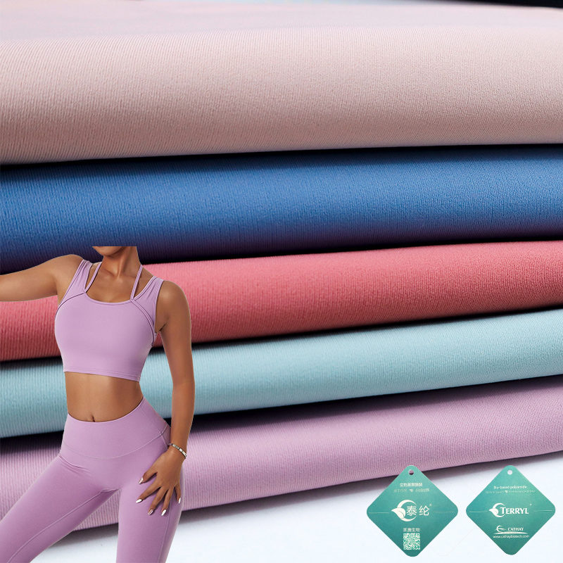 Yeni BIO-BASED kumaş fabrika özelleştirilmiş çevre dostu 4 yönlü streç örme Spandex naylon biyo bazlı kumaş