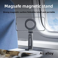 Nouveau support de téléphone et tablette universel magnétique en alliage d'aluminium pour voyage, rotation à 360 degrés, design pliable et portable