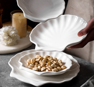 Nouvelles assiettes en porcelaine fine écologiques à motifs unis, polyvalentes, en céramique, créatives, pour sauces et desserts, idéales pour hôtels et mariages - Product Image 1
