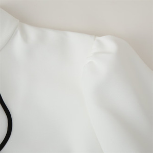 Abito Casual da donna bianco <span class=keywords><strong>con</strong></span> gonna corta Sexy a <span class=keywords><strong>manica</strong></span> lunga a mezzo collo alto <span class=keywords><strong>con</strong></span> decorazione a bottone cavo stile Streetwear intrecciato - Product Image 5