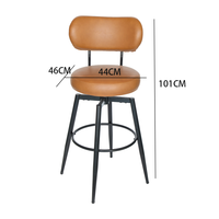 Tabouret de bar pivotant moderne en cuir noir avec dossier souple, coussin rond, repose-pieds et pieds en métal – Mobilier de loft