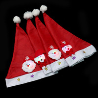 Gorros Navideños LED con Luces, Gorros de Santa Claus, Gorros de Muñeco de Nieve y Alces de Dibujos Animados para Adultos y Niños, Decoraciones Navideñas