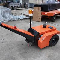 Tracteur de remorquage électrique à batterie à forte force de traction pour le déplacement de remorques sur les chantiers de construction en extérieur
