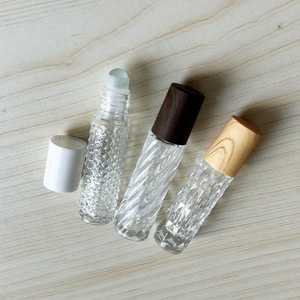 Flacon roll-on en verre épais transparent de 10 ml pour huile corporelle, parfum, sérum, huile essentielle avec bille roulante en métal et capuchon blanc - Product Image 3