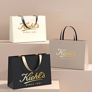 Custom Printed Coated Paper <b>Bags</b> Luxury Flat Handles Foil Sealed Christmas Shopping <b>Bags</b> OEM Black - Product Image 1