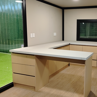 Casa Contenedor Expandible de Dos Pisos con Estructura de Acero Corrugado Negro, Iluminación LED, Villa Prefabricada, Venta al Por Mayor de Fábrica