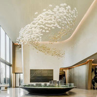Lustre suspendu moderne personnalisé en verre en forme d'œuf pour plafond dans le hall d'un hôtel de luxe avec lumières décoratives de longue forme