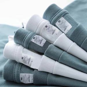 <span class=keywords><strong>T</strong></span>-<span class=keywords><strong>shirt</strong></span> <span class=keywords><strong>de</strong></span> couleur unie pour hommes et femmes, en coton, noir et blanc - Product Image 1